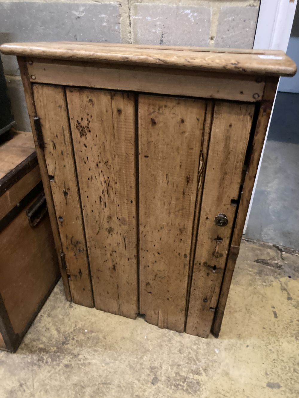 A 19th century pine wall cabinet, width 59cm depth 32cm height 84cm, together with a wirework rack